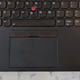 The ThinkPad X1 Yoga has a damn near silent trackpad.